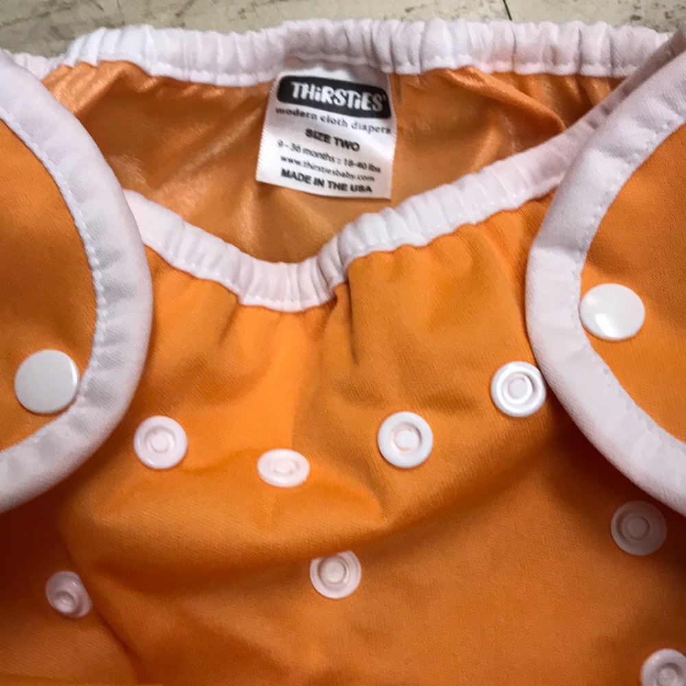 SOLD - Two Used baby adjustable diaper covers
